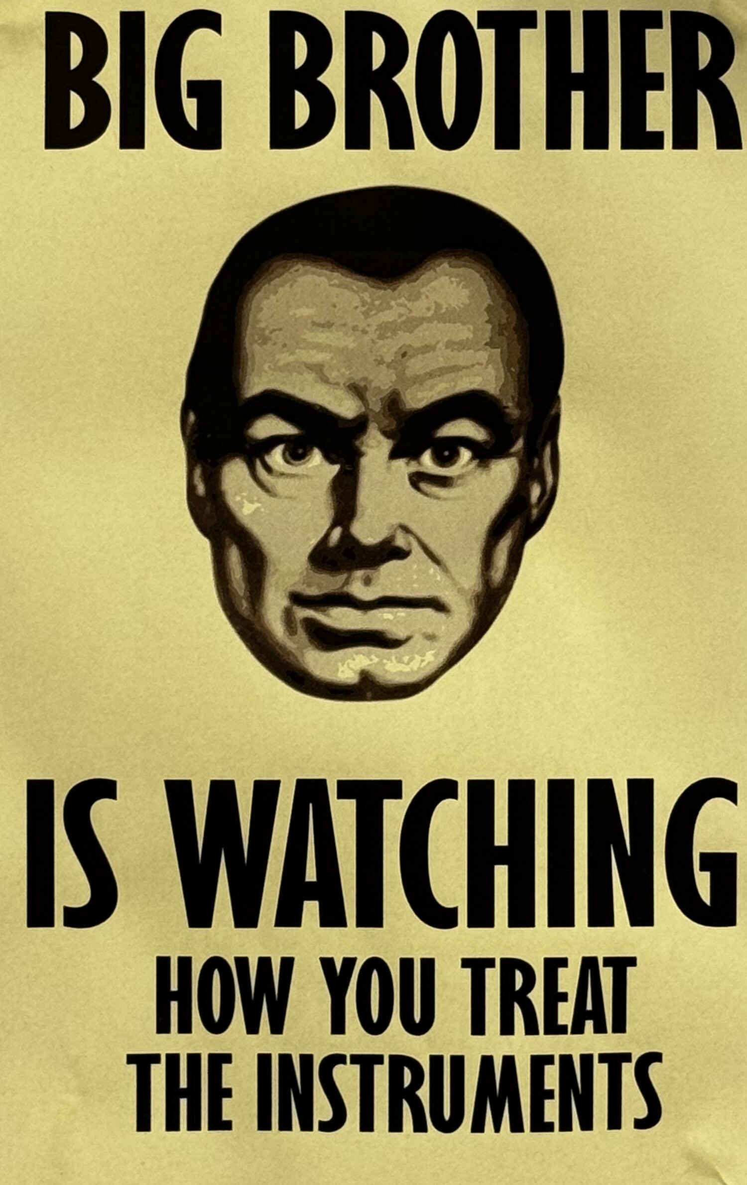 A yellowed Big Brother is Watching poster reading 'is watching how you treat the instruments'